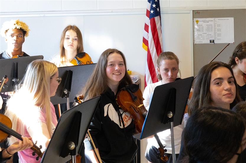 Students play in orchestra